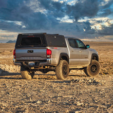 Load image into Gallery viewer, FOX Factory Race Series w/ DSC Reservoir, Front Coilover, 0-3&quot; Lift, 2005+ Tacoma 2/4WD
